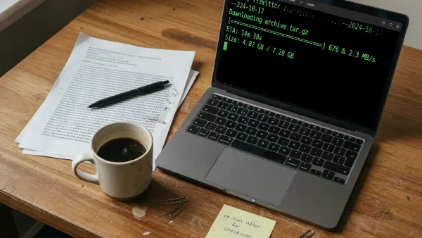 Laptop terminal showing a pip download of a large wheel file next to a printed SHA256 checksum, wood desk, no logos